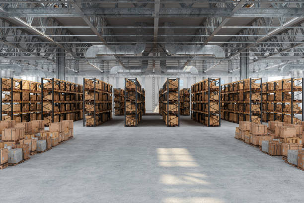 distribution warehouse with cardboard boxes on the racks and on the floor